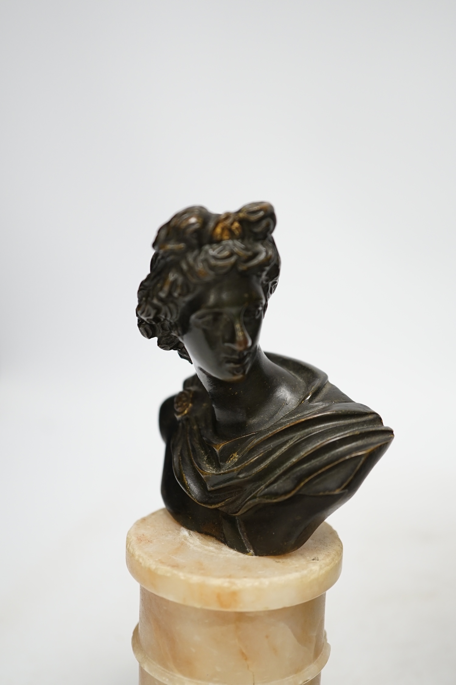 After Isaak Duchemin, a bronze figure of Pan, together with a bust of Apollo, tallest 37cm. Condition - fair